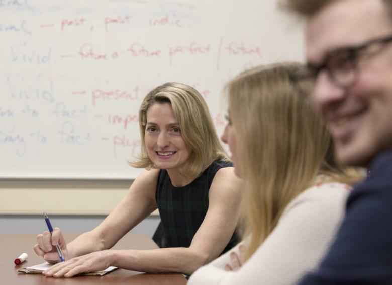 Dr. Albright with students in class